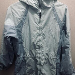 Columbia Sportswear women's hooded windbreaker rain jacket in light blue Medium